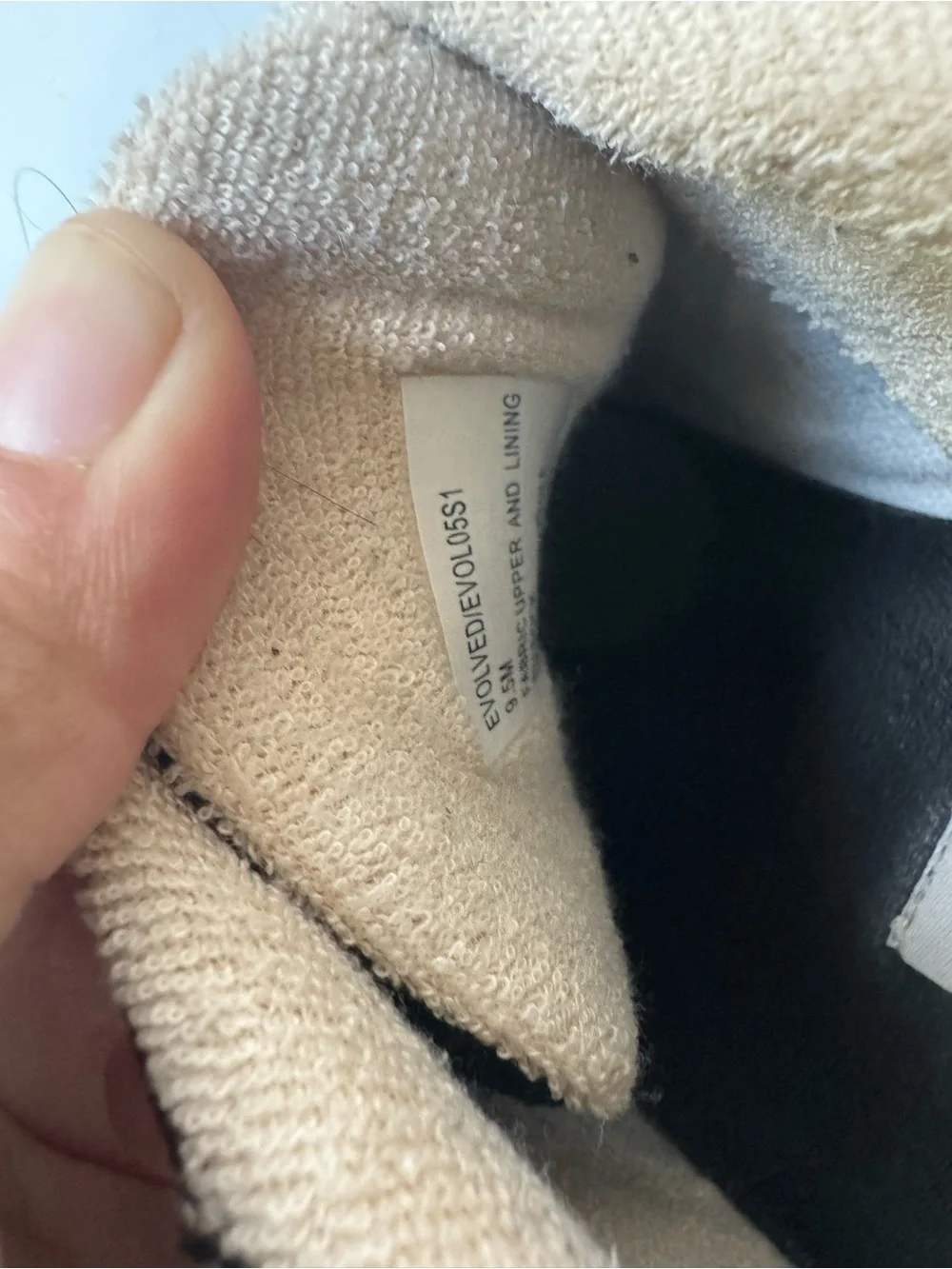Steve Madden Evolved Sneaker in black with a chunky cream and tan platforms 9.5